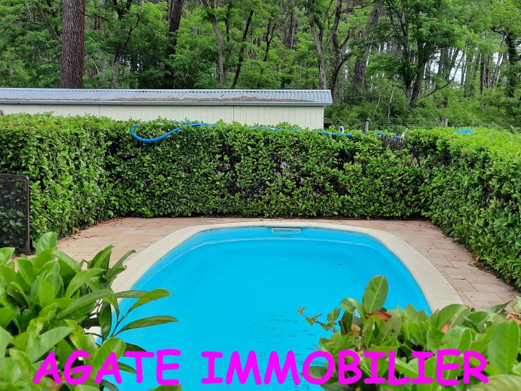 TERRAIN CONSTRUCTIBLE AV  PISCINE ET MOBILE HOME A PRECHAC