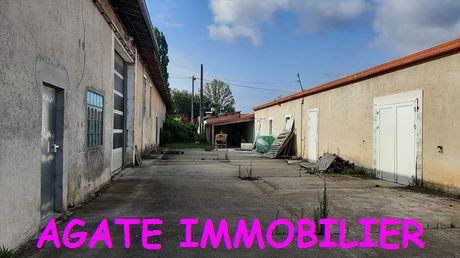 BATIMENT ET GARAGE SUR 1 500 M2 DE TERRAIN